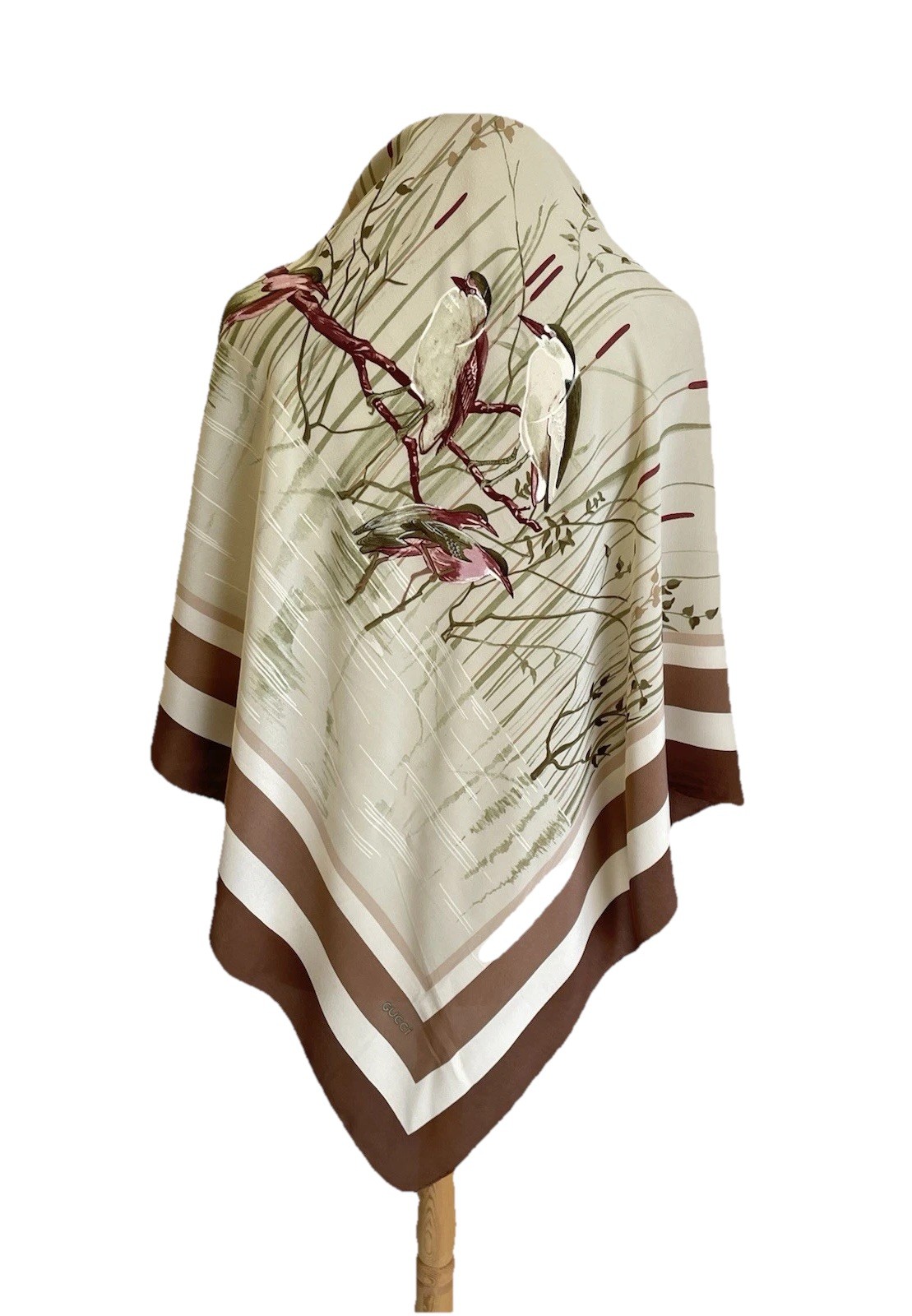 Beige and brown silk foulard scarf printed with herons standing among reeds at a pond's edge