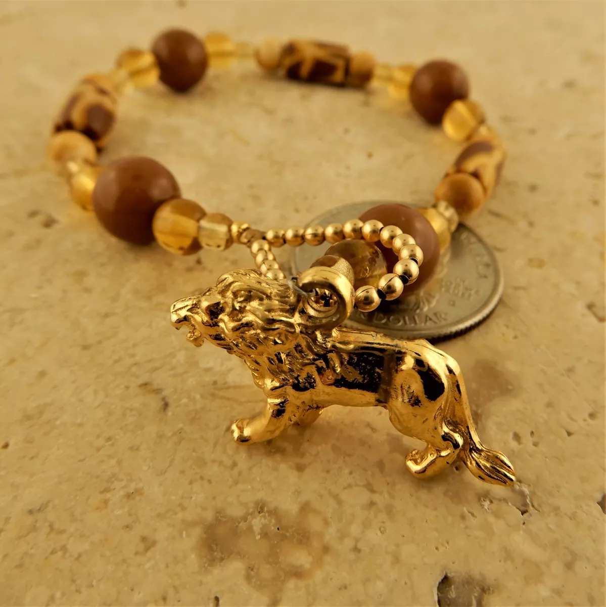 22kt Gold plated Lion charm bracelet with Giraffe fimo clay beads