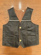 Kids vintage 1970s western-style leather vest with a shearling lining
