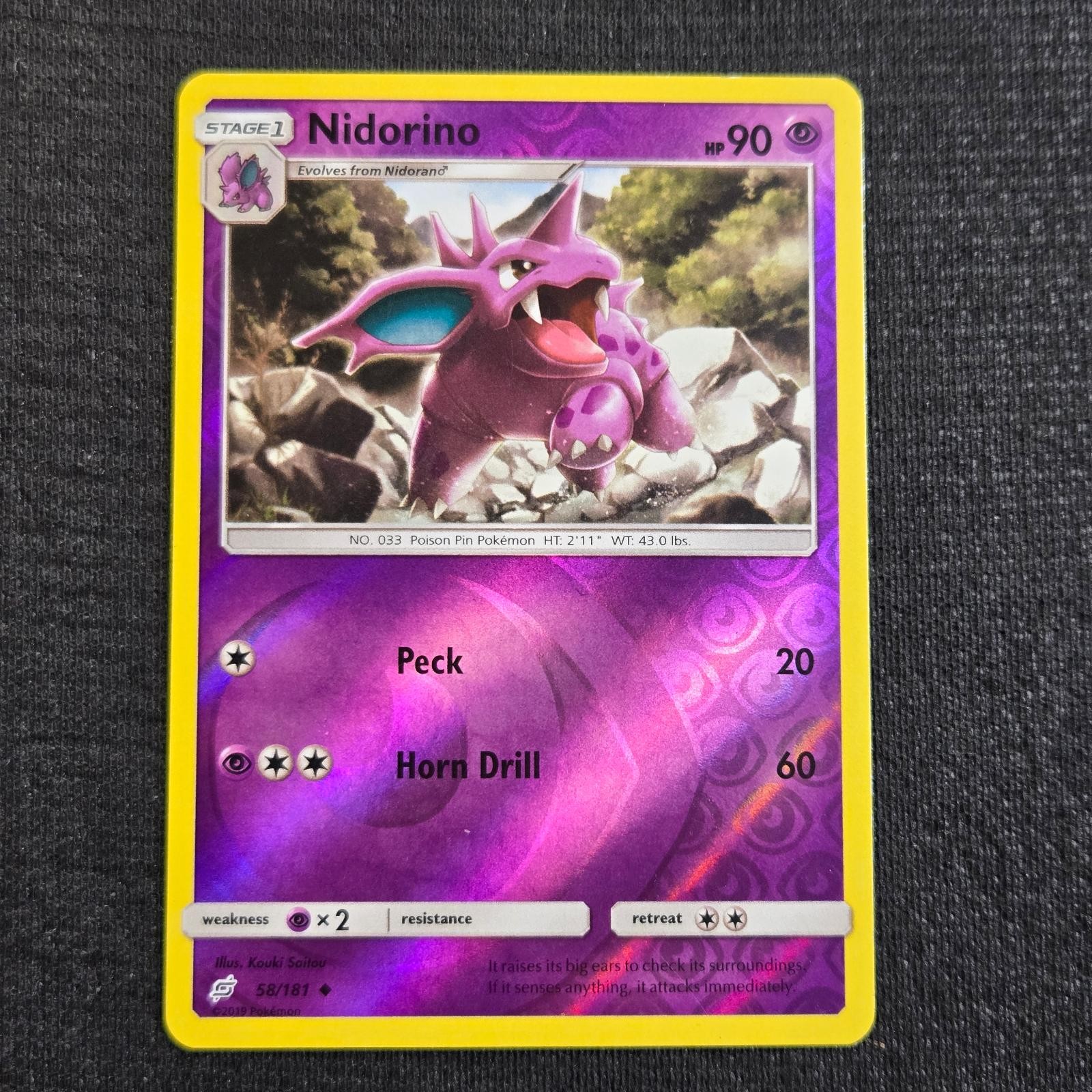 Pokemon Team Up Nidorino 58 Reverse Holo Lightly Played
