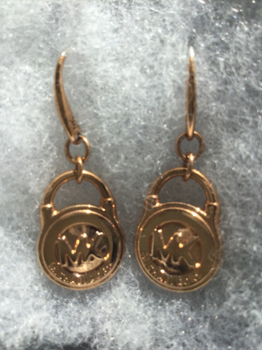 MICHAEL KORS GOLD TONE DANGLE ROUND PADLOCK LOOK EARRINGS