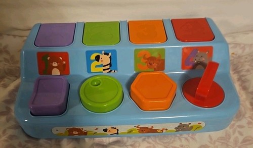 Pop up play right for infants. Teaching cause and effect
