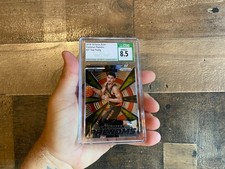 Trae Young Panini Prizm Rookie Card 2018-19 CSG 8.5 NBA Hawks 21 Freshman Phenom. rookie card picture