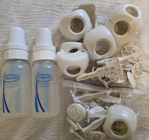 Variable Childproof Hardware, electric sockets, Door handles, 2 bottles