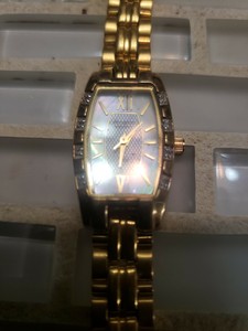 gold armitron watch