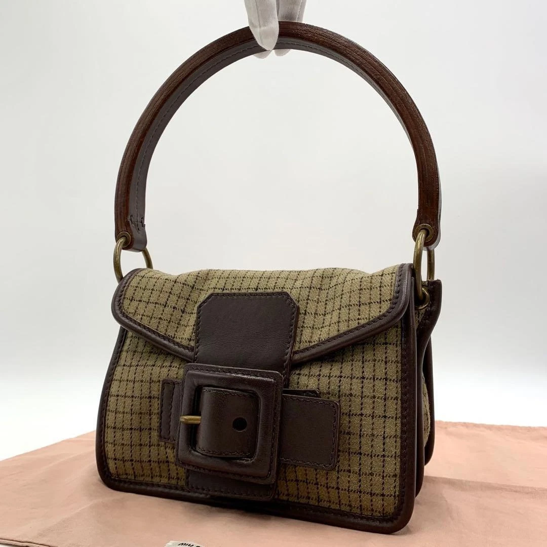 Miu Miu Buckle Leather Exterior Bags & Handbags for Women for sale