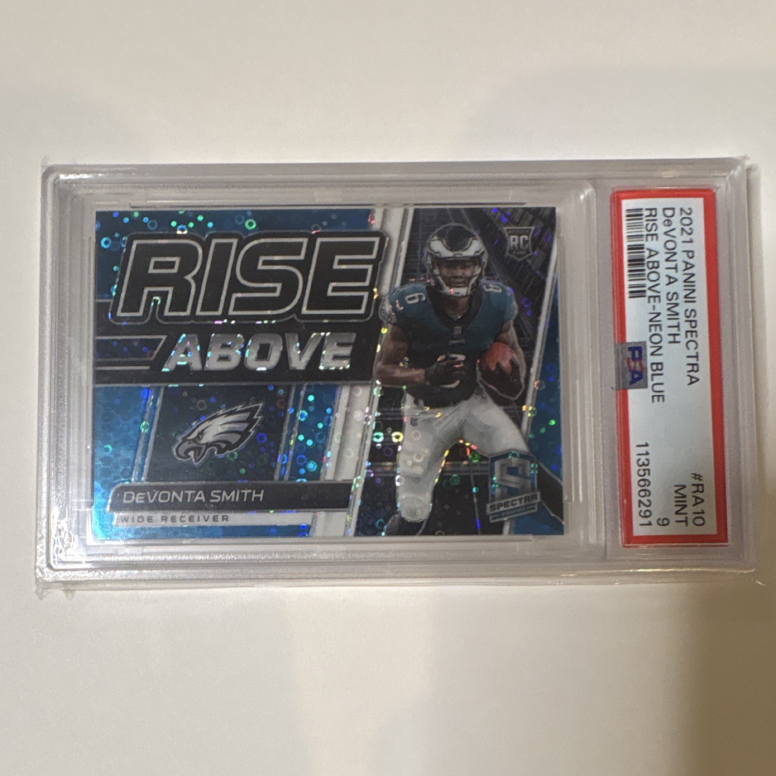 DeVonta Smith Panini Spectra Rise Above #RA10 Neon Blue