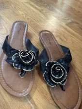 Black and gold sandals with rose detail glamour