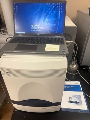 Applied Biosystems 7500 FAST DX REAL-TIME PCR INSTRUMENT WITH THE COMPUTER.