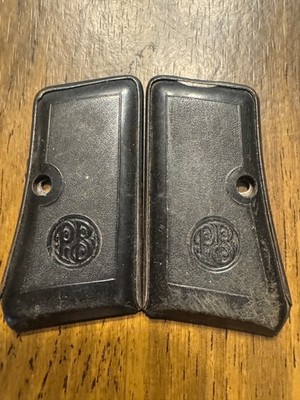 Factory Original Beretta 25 cal Steel backed Pistol grips