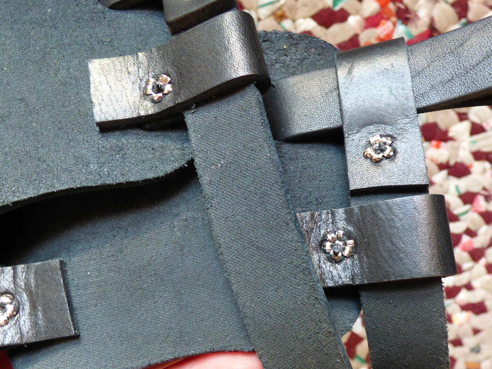 Brand new pair of black colored leather bindings for snowshoes