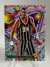 Hakeem Olajuwon 2023-24 Topps Cosmic Chrome #47 Nucleus Refractor - Rockets