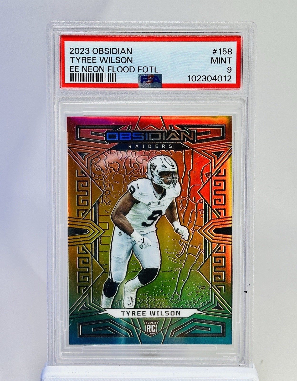 2023 Panini Obsidian Tyree Wilson RC Neon Flood FOTL /3 PSA 9 Raiders #158