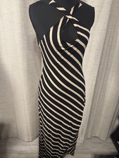 Venus black and tans high low maxi dress. Very attractive on