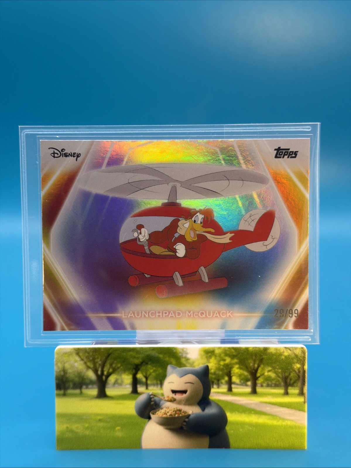 2026 Topps Disney Neon Launchpad McQuack Rainbow /99 #124