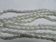 15 3/4" Strand Natural Freshwater Pearls Smooth Rice Silver 4-5mm Long 92 DNG