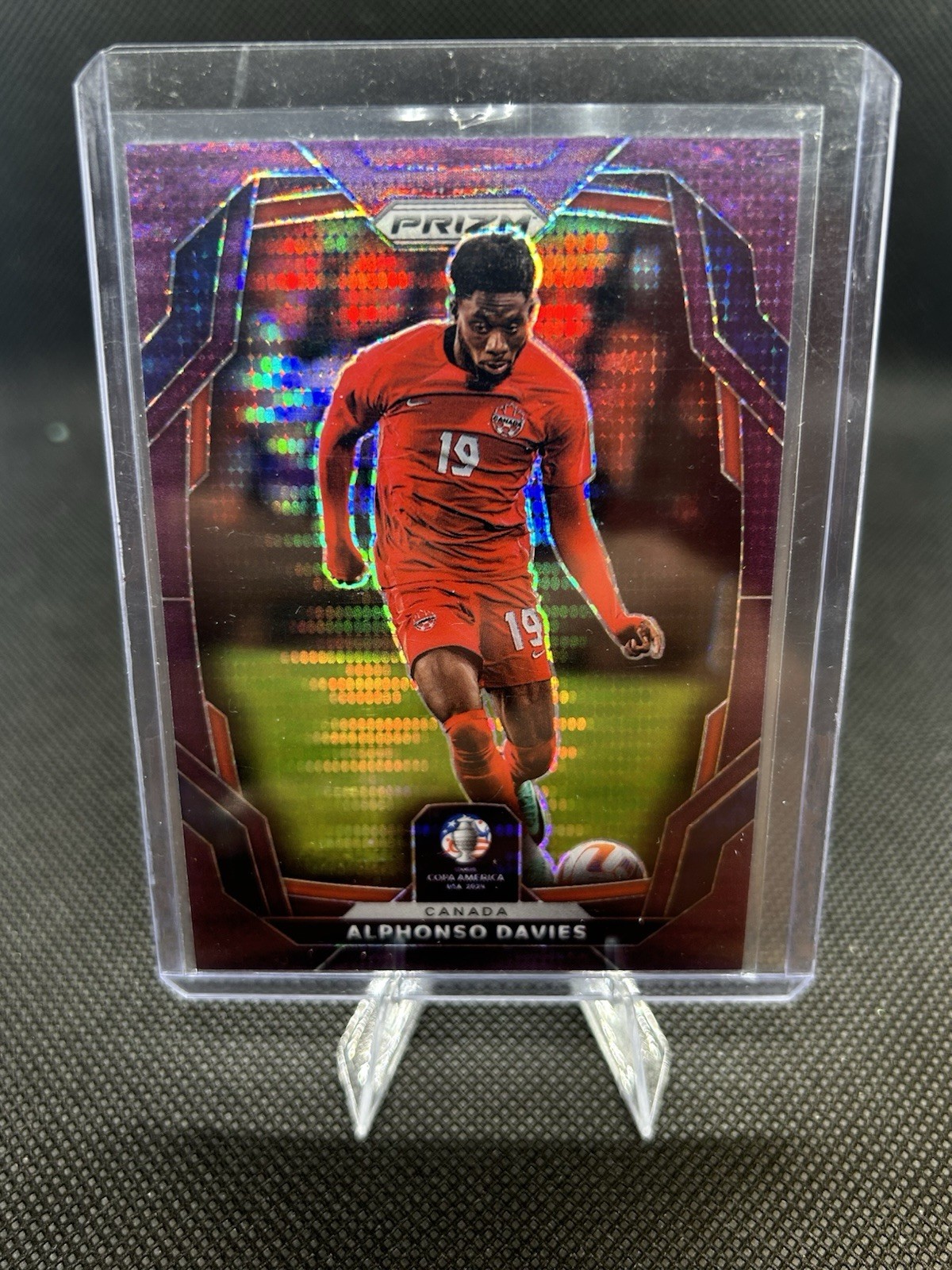 2024 Panini Prizm Copa America Alphonso Davies Purple Pulsar Prizm /49