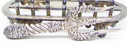 Vintage Gorham Sterling Repousse Toast Fork w/Toast Rack.  Excellent condition.