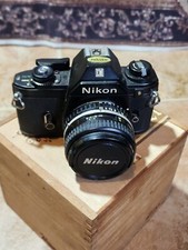 Nikon EM 35mm SLR Film Camera w/Nikon 50mm f/1.8 Lens Kit-  Tested  Working 
