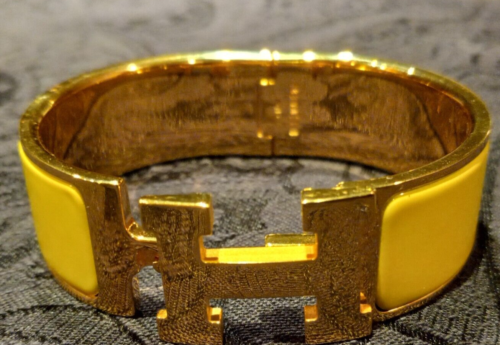 Hermes Clic Clac H Yellow Enamel Gold Plated Bracelet in Excellent Condition