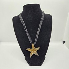 starfish art glass pendant on black lace cord