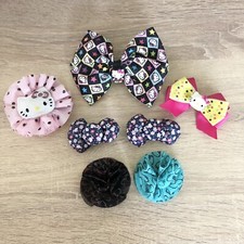 Assorted 7 Piece Hello Kitty mid to large size fabric hair clips