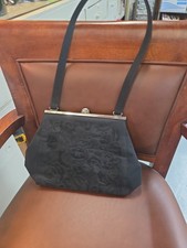 VINTAGE BLACK DETAILED PURSE WITH STRAP.