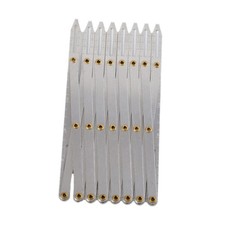 Jauge de couture extensible pour le marquage des trous de bouton du travail