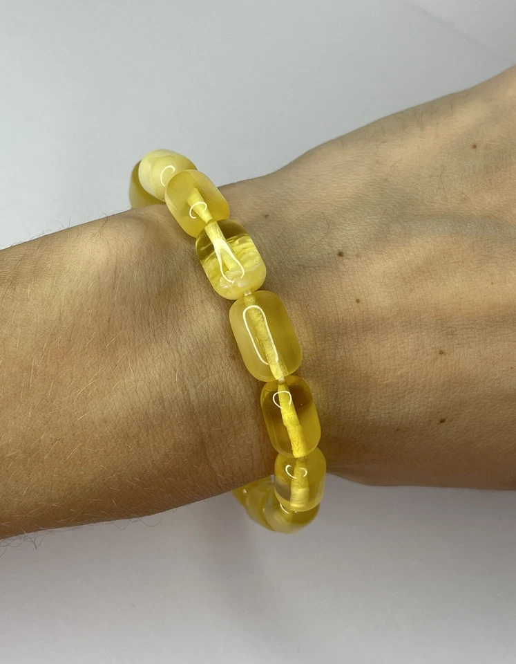 Pulsera con cuentas de piedra ámbar amarilla en forma de barrel.Pulsera de piedra ámbar multicolor. Foto 4 de 4