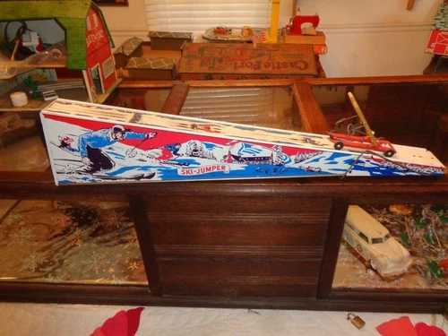 Vintage Wolverine Ski Jumper Tin Litho Spring-Activated Toy With Skier