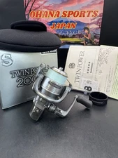 Shimano 02 Twin Power 2000 Spinning Left handle Used With Box Rank C