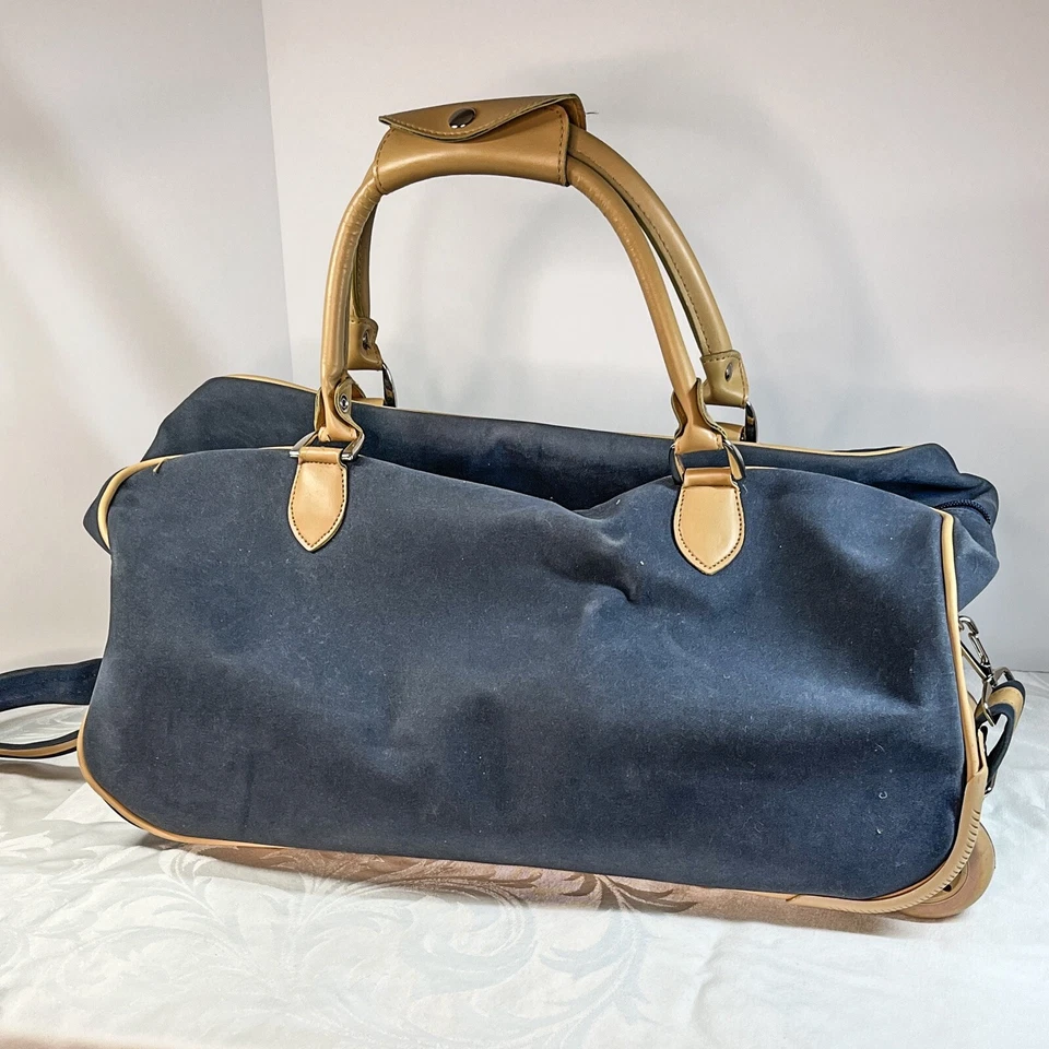 Equipaje de Mano Pegasus Material Azul Cuero Camel Detalle 19.5" Largo 11" Alto Foto 3 de 4