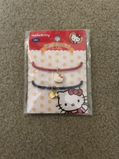 Sanrio Hello Kitty Set Of 2 Blue/Red Jewel Hair Ties/Bracelets NEW