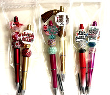 6 miscellaneous beaded pens with 1  ink refill each- nurse theme