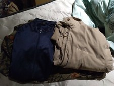 Unisex adult clothes lot shirts, pants and jackets for sale.