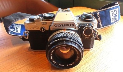 Olympus OM-10 35mm SLR Film Camera with 50 mm lens Kit