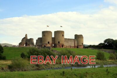 PHOTO  RHUDDLAN CASTLE TAKEN FROM STATION ROAD. RHUDDLAN CASTLE STANDS ABOVE THE
