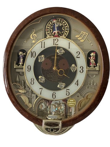 Seiko Swarovski Crystals 8 classic Melodies in Motion oval Wall Clock QXM147BRH