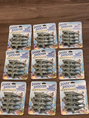 LOT OF 9 New Shark Shooters 4-Pack Stretch Fling It Toy Finger Slingshots