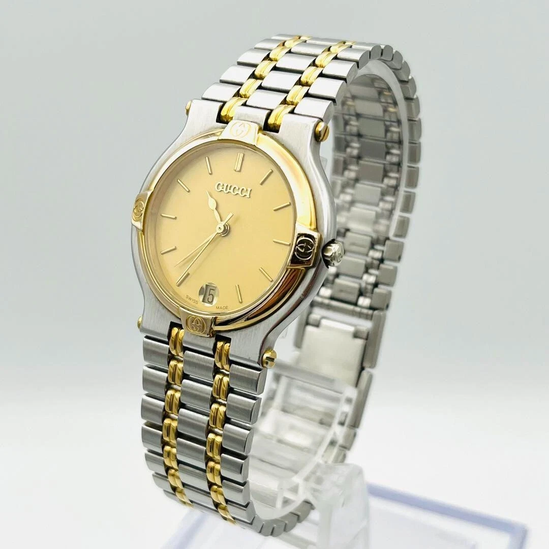 MONTRE VINTAGE GUCCI 9000M 32 mm OR ARGENT DATE DE FABRICATION SUISSE