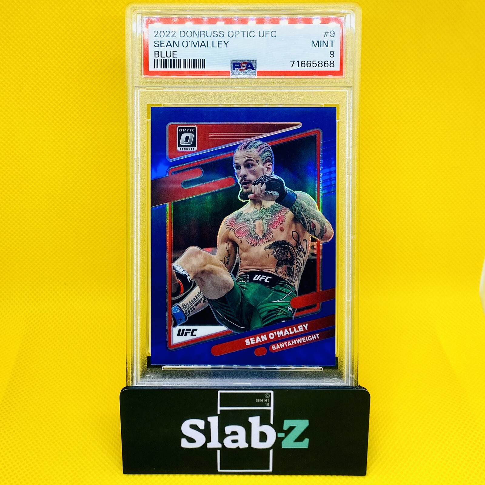 2022 UFC Panini Donruss Optic SEAN O’MALLEY /99 BLUE PRIZM, #9, PSA9 MINT!