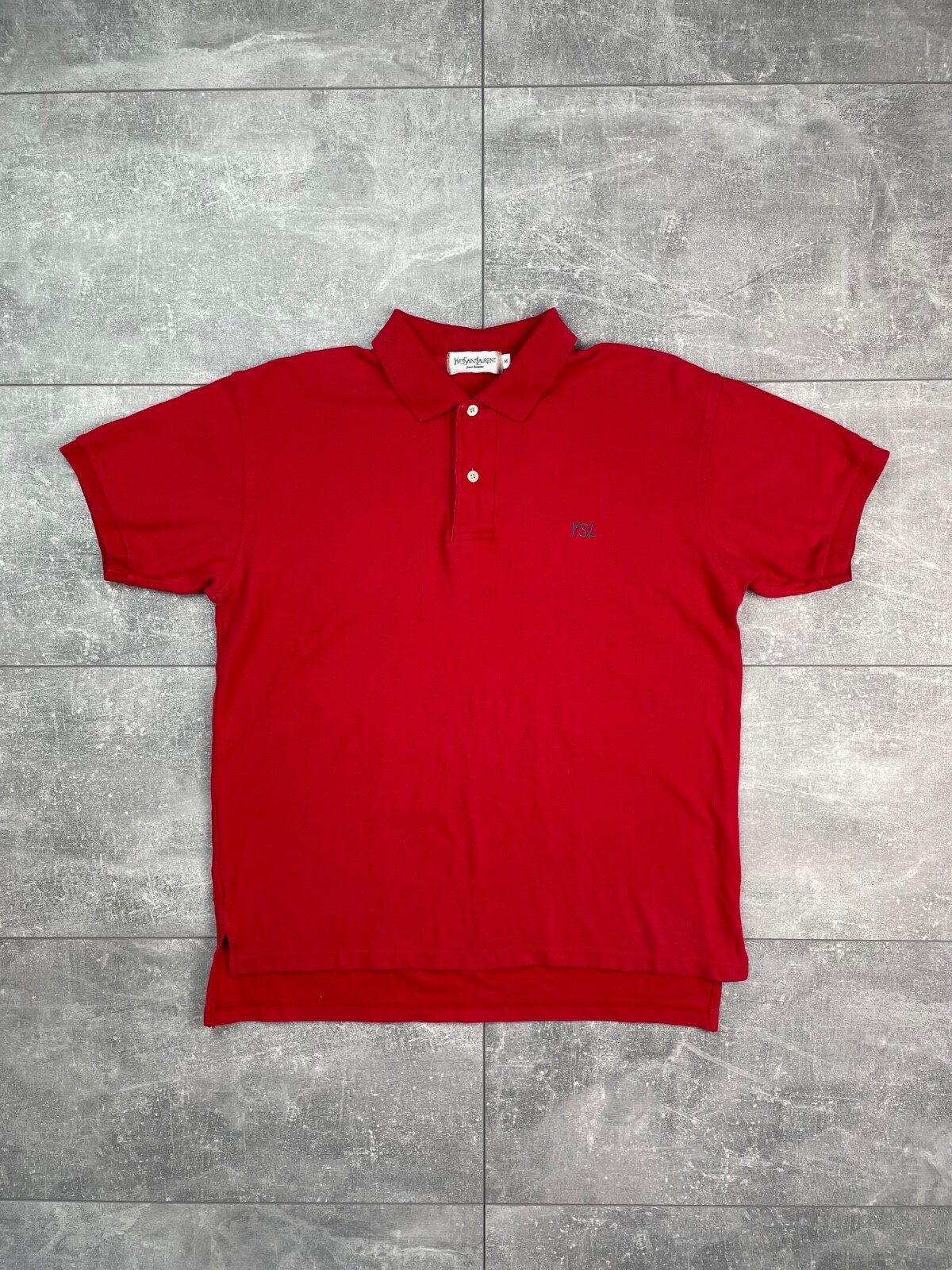 Polo Yves Saint Laurent con logo YSL