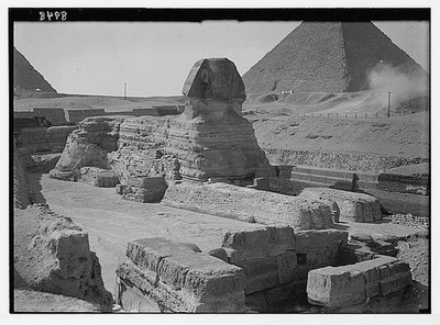 Egypt. Sphinx & pyramids. The Sphinx (3/4 face) & the three pyramids