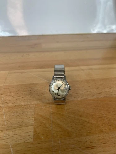 Vintage Timex Women's Mechanical Watch Date Silver Dial Stretch Band 1970s