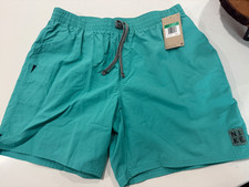 New with tags Teal Nike Swim Trunks, Men  s XL