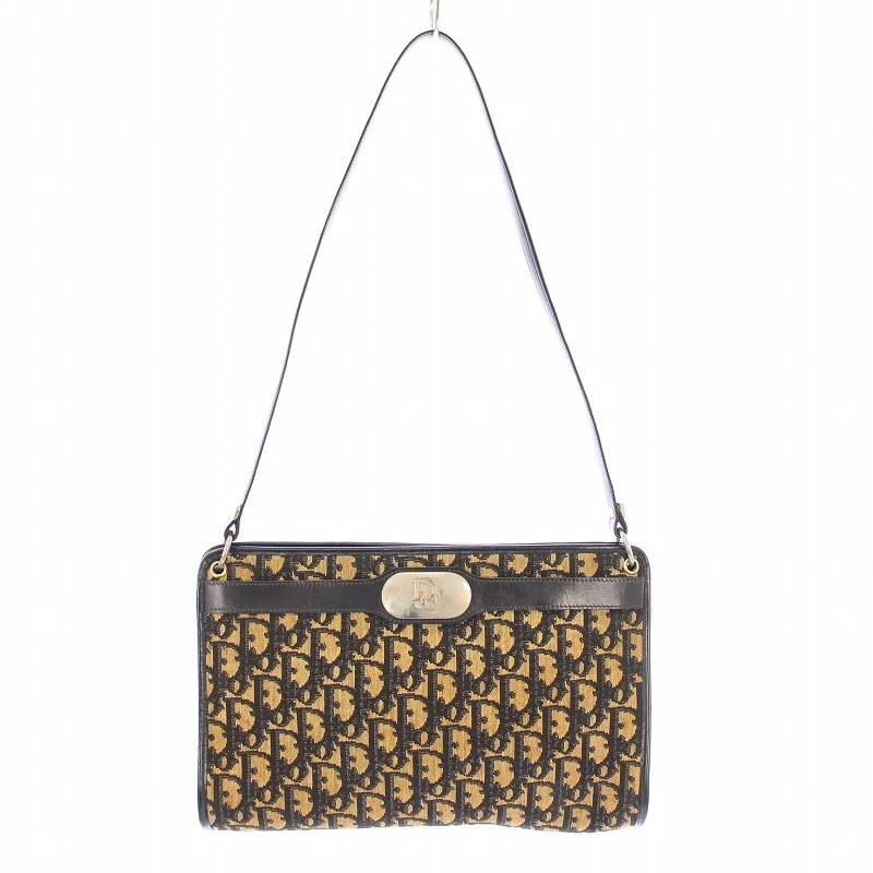 Christian Dior sac à bandoulière vintage une toile cuir changement logo trotteur