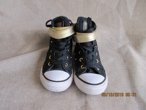 black and gold chucks