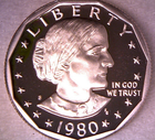 1980 S SBA $1 Proof Susan B. Anthony dollar with “LIBERTY” and “IN GOD WE TRUST” text, encircled by thirteen stars.