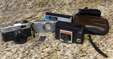Lot of 4 Vintage Film Cameras Point  Shoot Zoom lens SD card cases, untested
