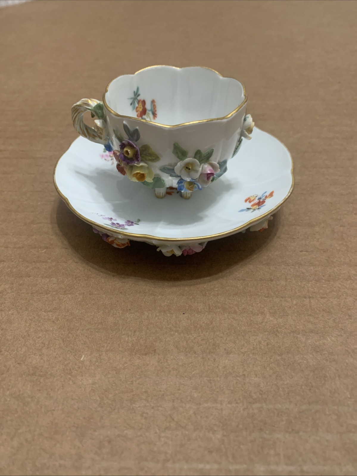 Meissen Porcelain Tea Cup and Saucer Set Encrusted Flowers Gold Trim